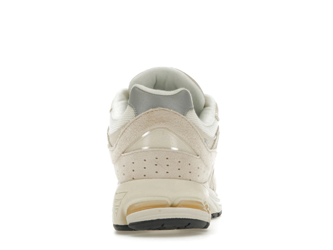 780859 New Balance 2002R Off White