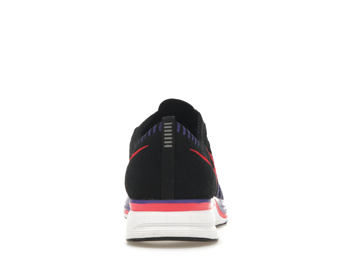 780529 Nike Flyknit Trainer Siren Red Persian Violet